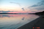 Закат солнца на реке Лиелупе. Вид с Белой дюны на море.